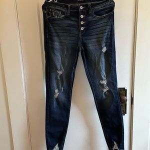 Mid rise Distressed jeans.